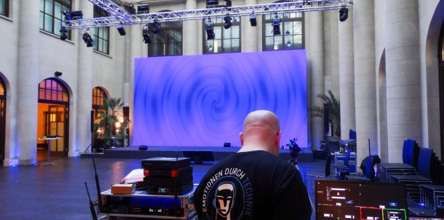 Technician setting up an INFiLED EZ Series LED wall at Humboldt Carrer in Berlin